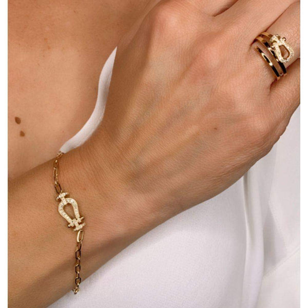 Pulsera hardware de oro amarillo con diamantes
