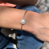 Pearl & Diamond Cuff Bangle.  14K Yellow Gold: 2.90 grams 1 Diamond: 0.03 ct 1 Pearl