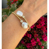 Two Baroque Pearls & Diamond with Yellow Gold Bracelets