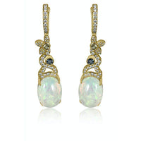 Aretes largos de oro amarillo con ópalo, aguamarina y diamantes
