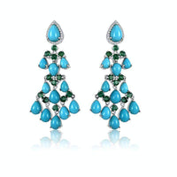 Aretes de turquesa con diamantes y esmeralda