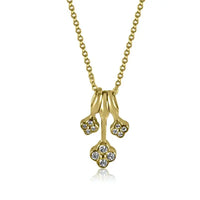Collar de tres flores de diamantes con oro amarillo de 14 quilates