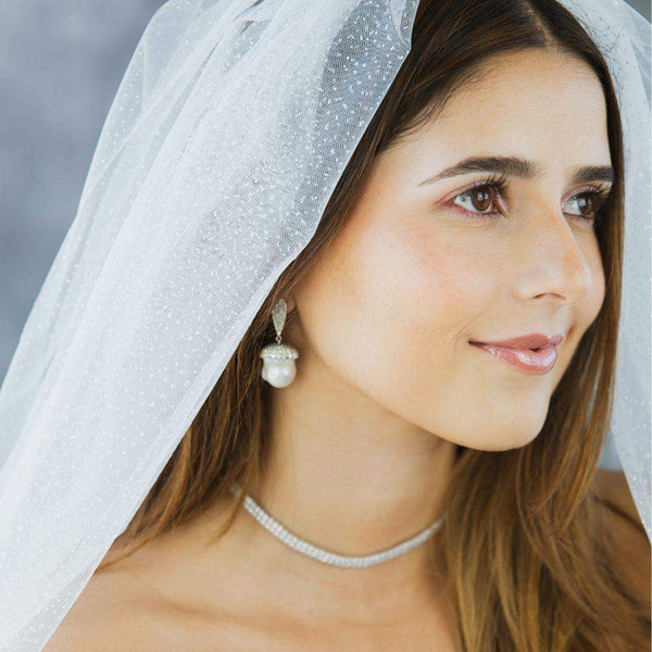 This pair of earrings are perfect for Diamonds & Baroque Pearl, this design gives the piece an elegant touch.