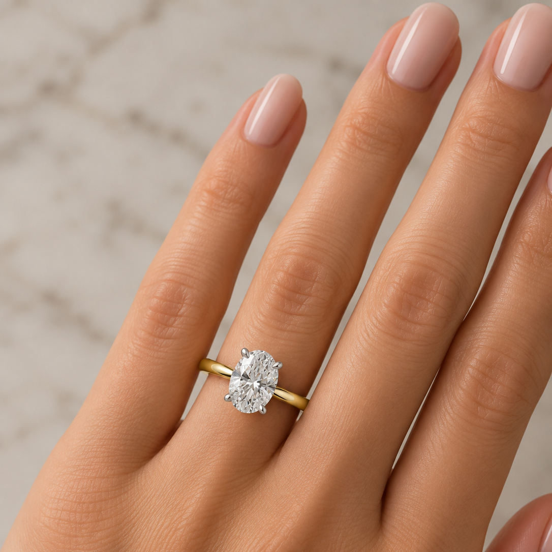 yellow gold ring with an oval