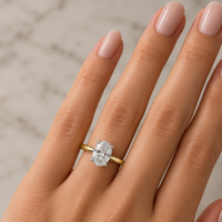 yellow gold ring with an oval