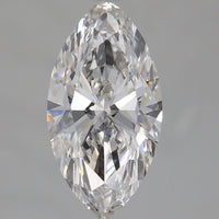 A single marquise-cut diamond shown in a close-up studio shot against a smooth gray background.