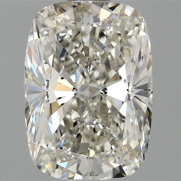 A cushion-cut brilliant diamond with brilliant faceting, shown in sharp detail against a solid gray background.
