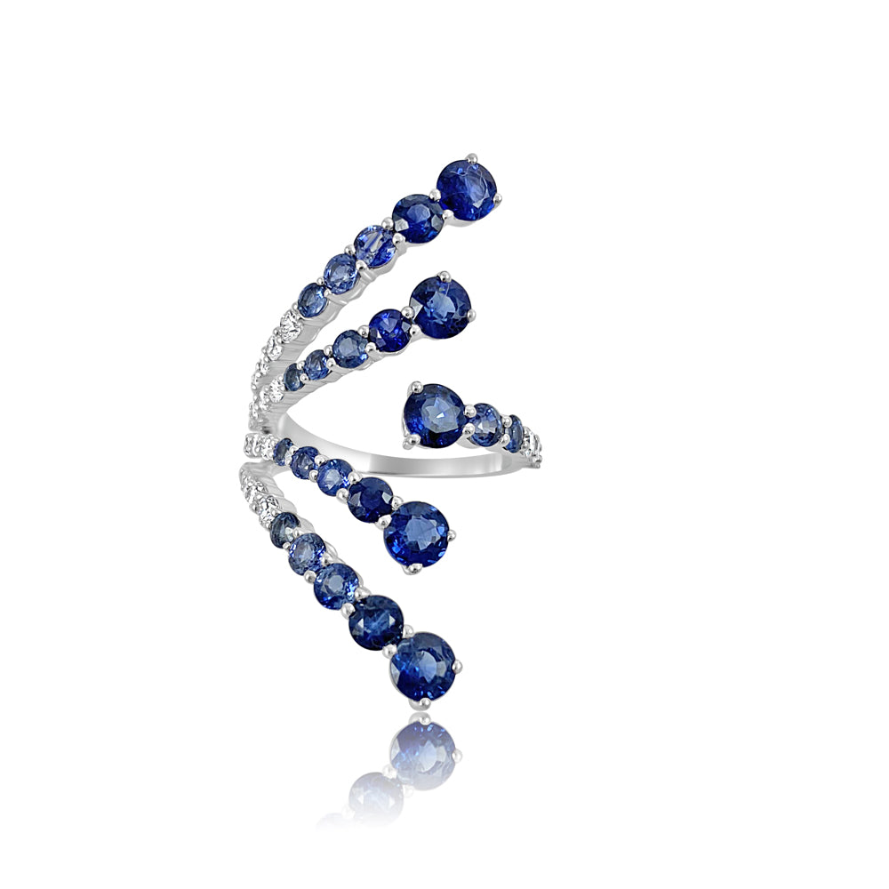 Blue Sapphires & Diamonds for a 18K White Gold Ring.  18K White Gold  Diamond: 0.57 ct Blue Sapphire: 4.13 ct