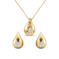 Gold teardrop-shaped jewelry set with embedded diamonds