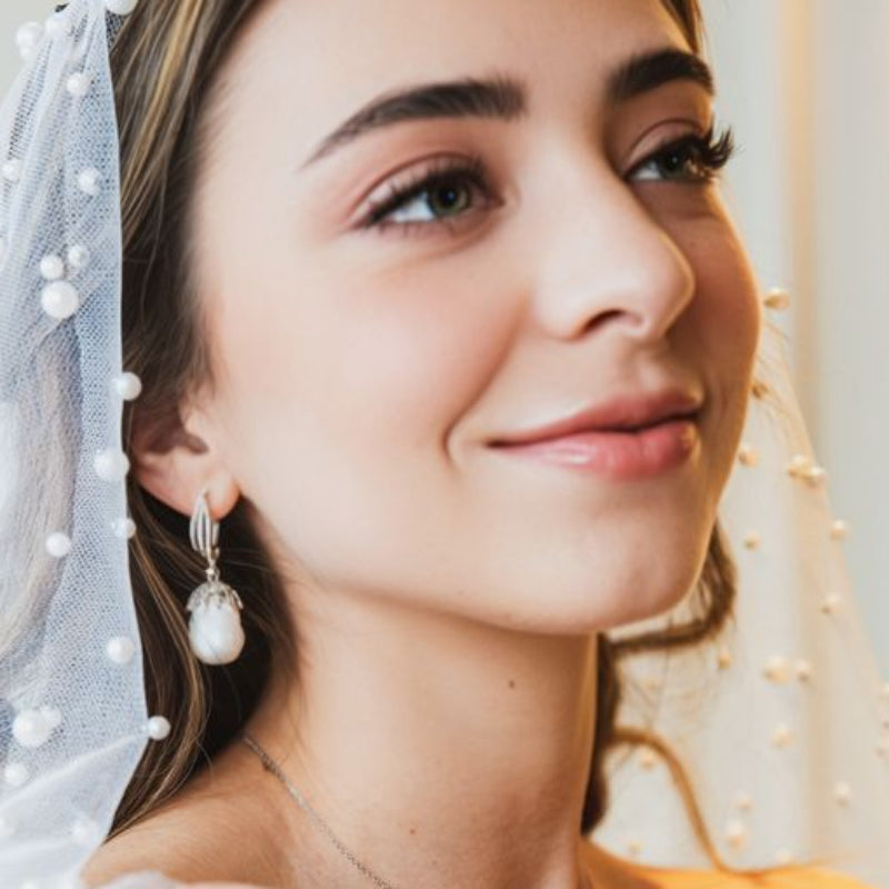 Aretes de perlas barrocas con diamantes