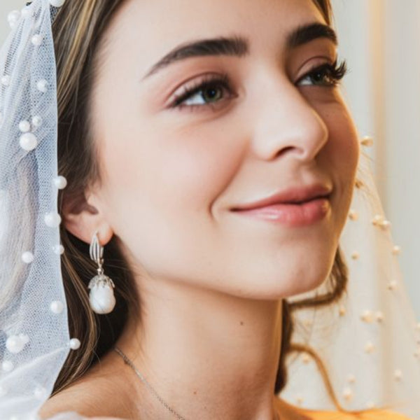 Aretes de perlas barrocas con diamantes