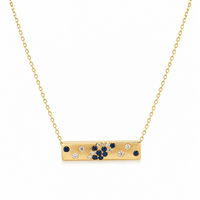 Collar de oro amarillo con zafiro azul y diamantes