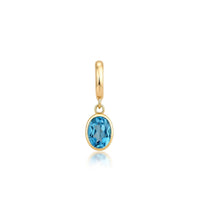 Dije de topacio azul con oro amarillo de 14 quilates