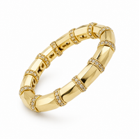 Anillo elástico de rayas de oro amarillo y diamantes