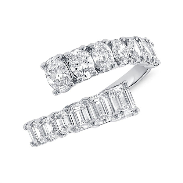 Diamond & Baguette Spiral Rings.  14K Yellow Gold weight: 3.67 grams 28 Baguette: 0.94 ct 4 Diamond: 0.05 ct
