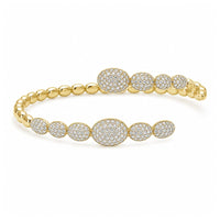 Brazalete con ovalos de diamantes y oro amarillo 