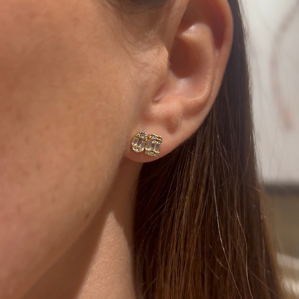 Aretes de diamantes como baguette y gota