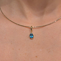 Blue Topaz Oval Charm with 14K Yellow Gold