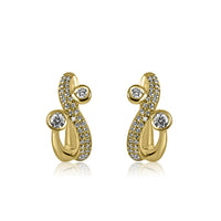 Aretes en curva de 14k oro amarillo con diamante 