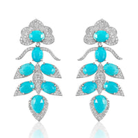Sleeping Beauty Turquoise & Diamond Lotus Vine Earrings.  Sleeping Beauty Turquoise: 13.32 ct Diamond: 2.98 ct Silver with Rhodium Plated: 12.73 grams Gold Post: 0.18 grams