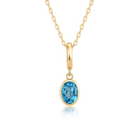 Blue Topaz Oval Charm with 14K Yellow Gold