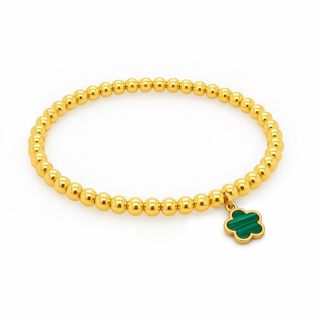 Brazalete con cuentas de oro amarillo con diamante 
