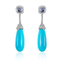 Turquoise Drop & Tanzanite Earrings  Sleeping Beauty Turquoise: 55.70 ct Tanzanite: 3.940ct Diamond: 1.09 ct Silver with Rhodium Plated: 4.34 grams Gold Post: 0.18 grams