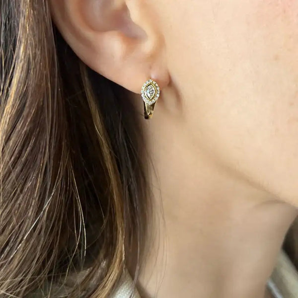 Aretes de 14k oro amarillo con diamantes en ojo