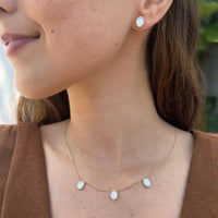 Conjunto collar y aretes óvalos de madreperla con diamantes