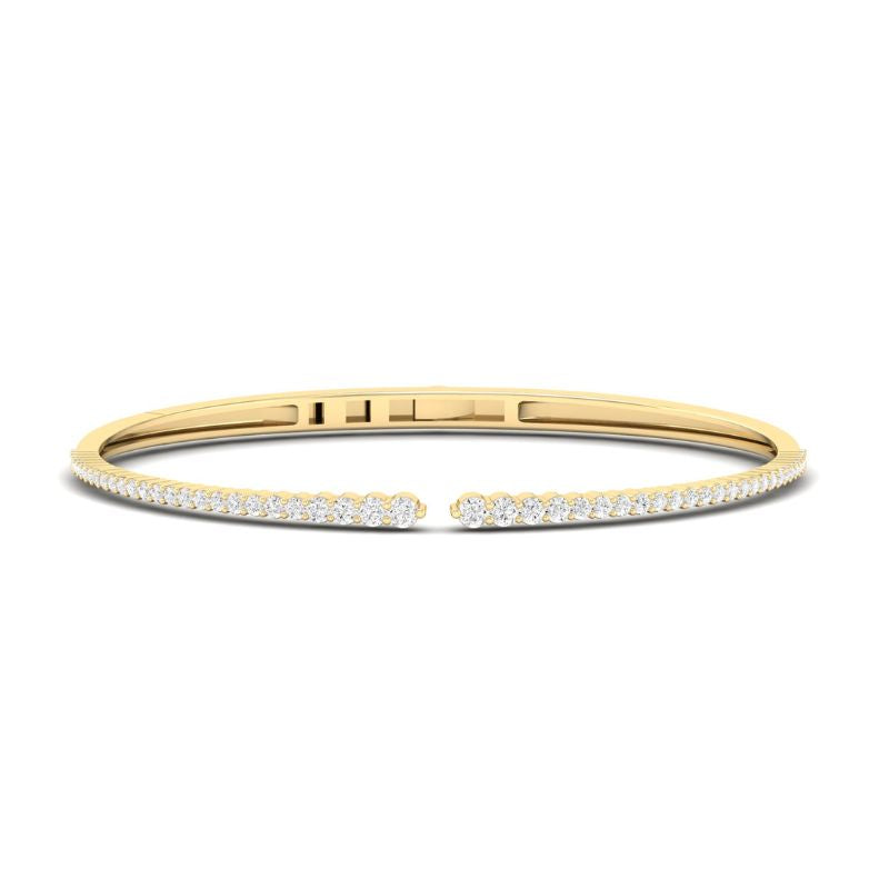 Pulsera que estrecaha con oro amarillo y diamantes