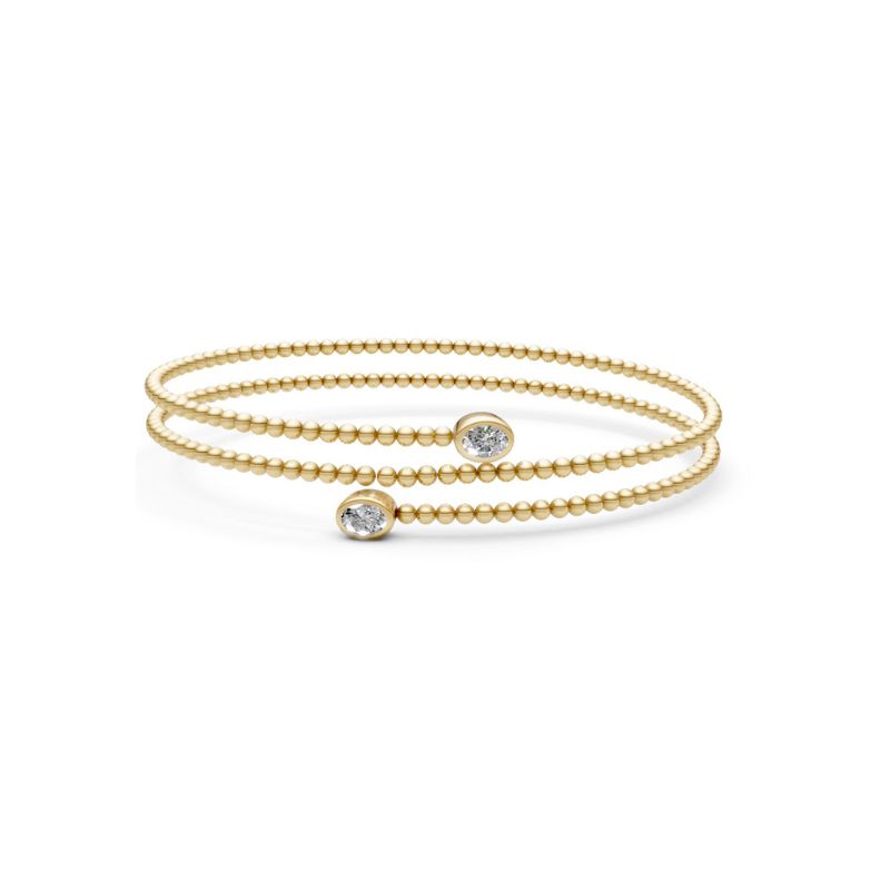 Pulsera que estrecaha con oro amarillo y diamantes