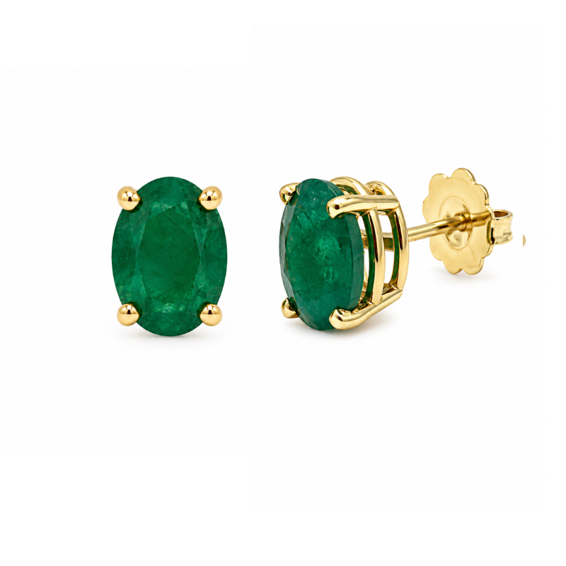 A pair of oval emerald-cut green gemstone stud earrings in yellow gold settings, with one earring facing forward and the other angled to show the post 