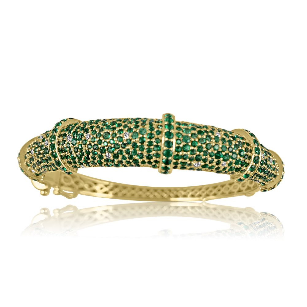 14K Gold Emerald with Diamond Bangle Bracelet Emerald: 6.480 ct Diamond: 0.47 ct 14K Yellow Gold: 27.12 grams Hinged Closure