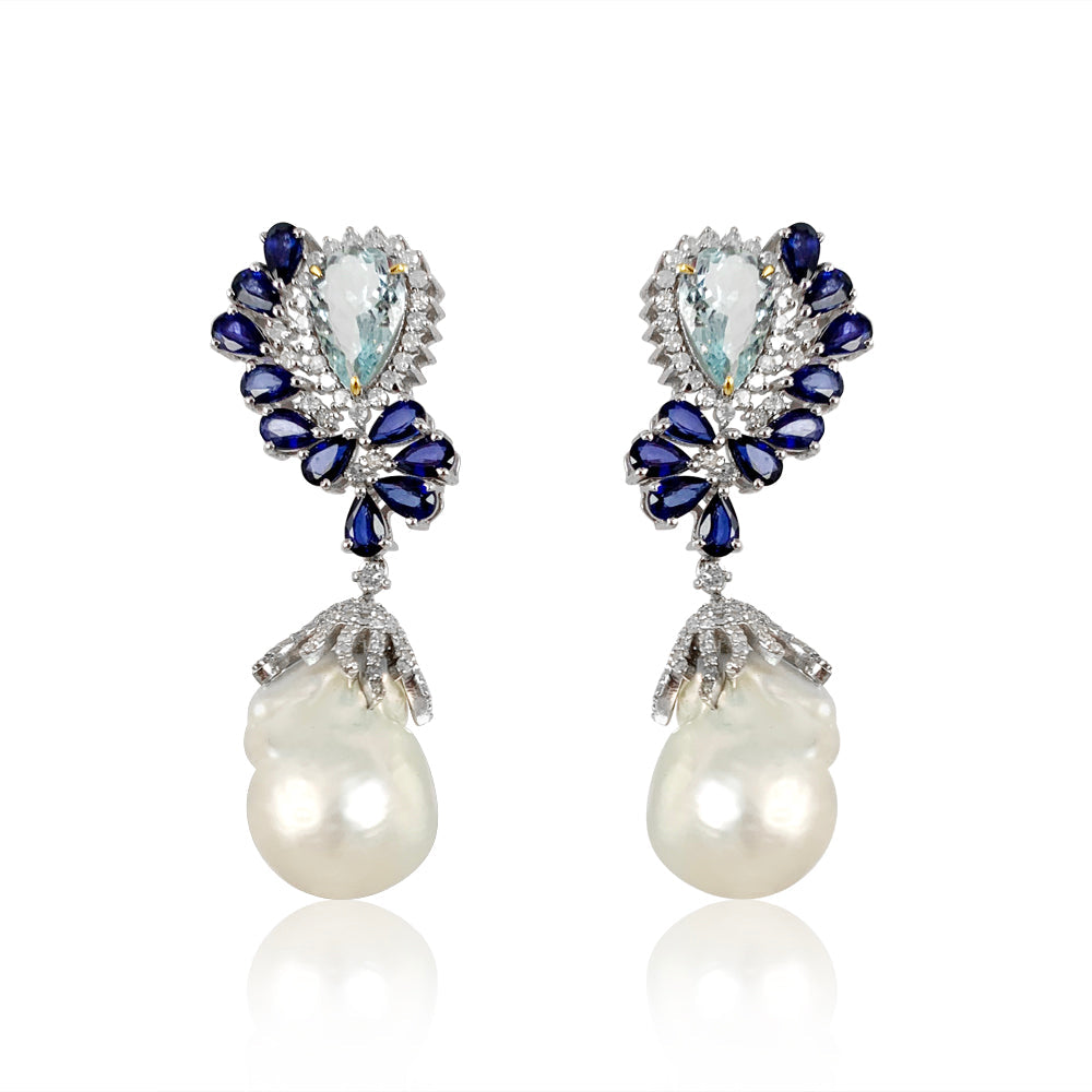 This pair of earrings are perfect for special occasions, this design gives the piece a feminine touch.  Diamond: 3.79 ct Aquamarine: 3.250 ct Blue Sapphire: 5.72 ct Pearl: 44.75 Silver with Rhodium Plated weight: 6.30 grams Gold Post