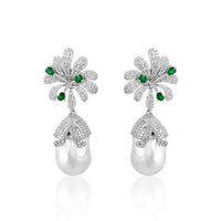 This pair of earrings are perfect for special occasions, this design gives the piece a feminine touch.  Diamond: 4.71 ct Emerald: 0.65 ct Pearl Baroque: 60.01 ct Silver with Rhodium Plated weight: 13.42 grams Gold Post: 0.15 grams