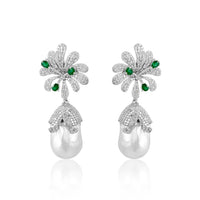 This pair of earrings are perfect for special occasions, this design gives the piece a feminine touch.  Diamond: 4.71 ct Emerald: 0.65 ct Pearl Baroque: 60.01 ct Silver with Rhodium Plated weight: 13.42 grams Gold Post: 0.15 grams