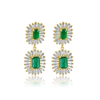 This pair of earrings are perfect for special occasions, this design gives the piece a feminine touch.  14K Yellow Gold Weight: 4.05 grams Diamond: 1.09 ct Emerald: 2.38 ct 84 Baguette Diamonds
