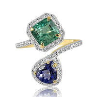 Elegant Emerald & Tanzanite with Duamond Two Stone Ring in 14K Gold  Diamond: 0.34 ct Tanzanite: 1.160 ct Emerald: 1.510 ct 14K White Gold weight: 2.42 grams