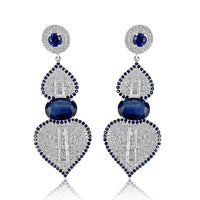 Kyanite with Diamonds & Baguette Spade Earrings  Diamonds: 3.73 ct Baguettes: 1.65 ct Kyanite: 8.98 ct Silver with Rhodium Plated weight: 13.19 grams Gold Post: 0.16 grams