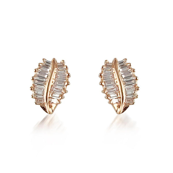 Studs 14k White or Rose Gold with Baguette Diamonds  Diamond: 0.31 ct 14K  Gold weight: 1.67 grams Post Back Closure