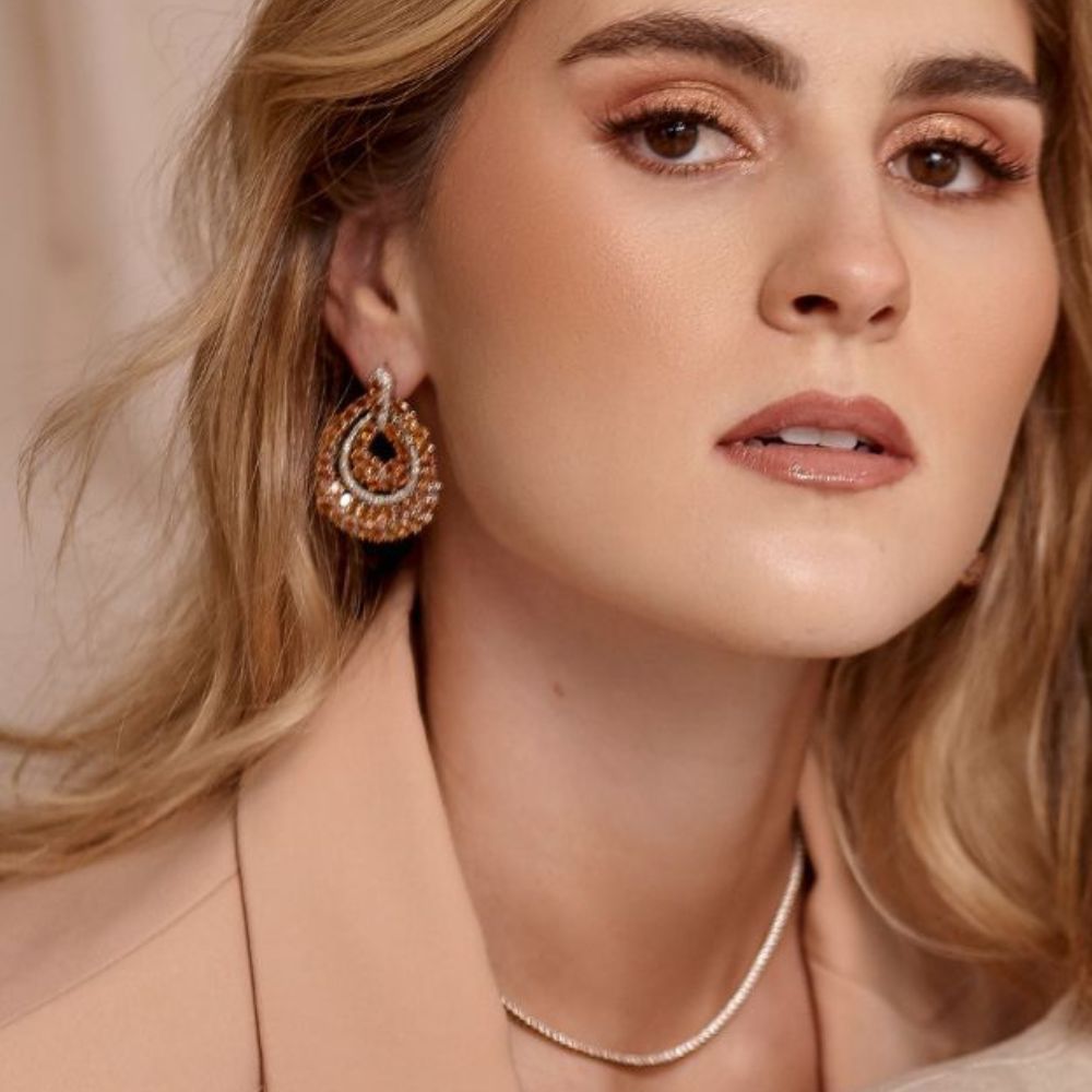 Elegant & feminine pair of earrings perfect for special occasions.  Orange Sapphire Circle Earrings