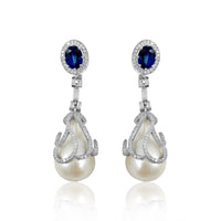 Pearl, Kyanite & Diamonds Earrings  Diamond: 1.77 ct Diamond Baguettes: 0.9 ct Pearl: 56.36 ct Kyanite: 4.65 ct Silver with Rhodium Plated weight: 8.3 grams