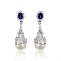 Pearl, Kyanite & Diamonds Earrings  Diamond: 1.77 ct Diamond Baguettes: 0.9 ct Pearl: 56.36 ct Kyanite: 4.65 ct Silver with Rhodium Plated weight: 8.3 grams