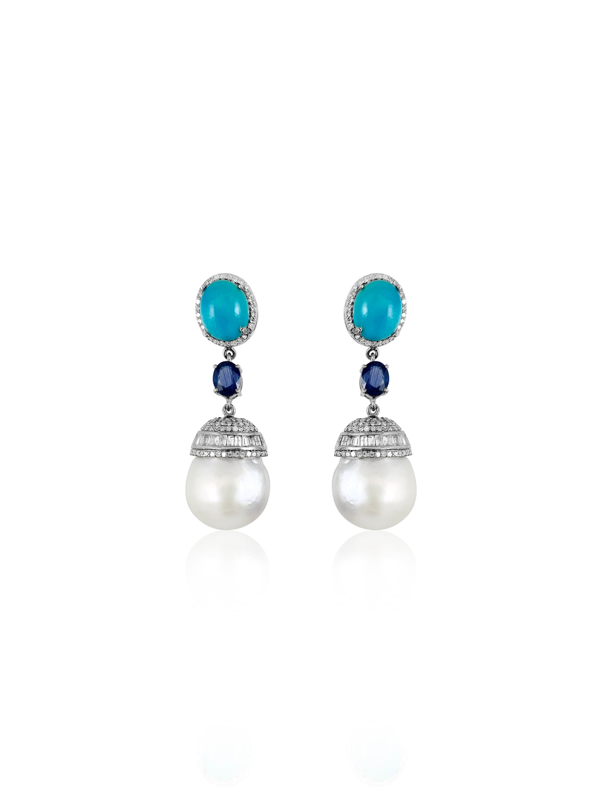 This pair of earrings are perfect for special occasions, this design gives the piece a feminine touch.  Diamond Turquoise Kyanite Pearl Barroque Silver with Rhodium Plated  Gold Post