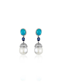 This pair of earrings are perfect for special occasions, this design gives the piece a feminine touch.  Diamond Turquoise Kyanite Pearl Barroque Silver with Rhodium Plated  Gold Post